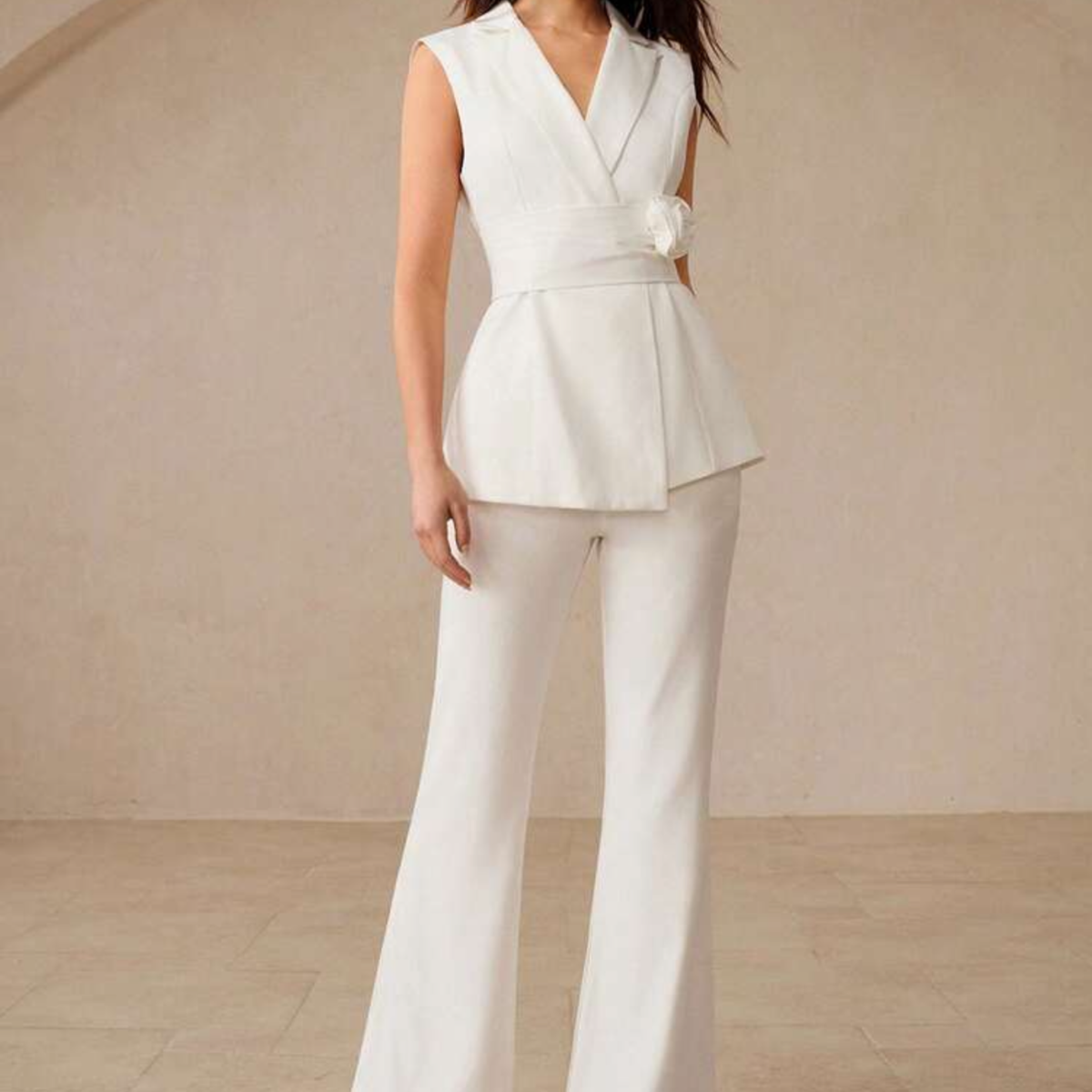 a model wearing the Aveloria White Co-Ord from Closet Concierge