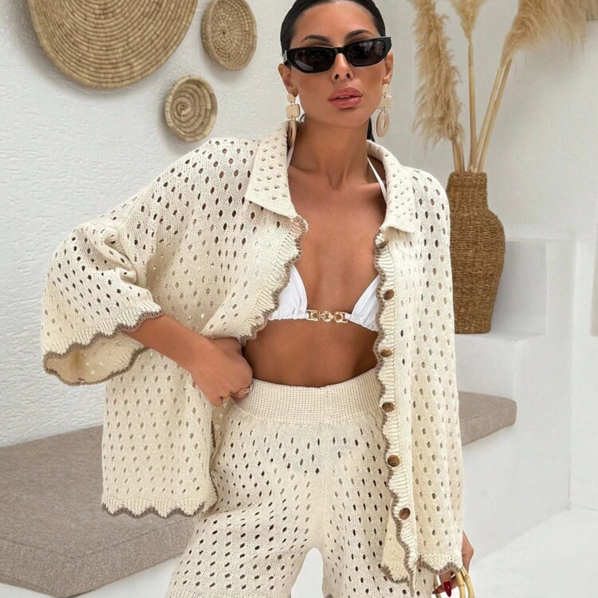 a model wearing the Cream Crochet Open Knit Oversized Shirt from Closet Concierge