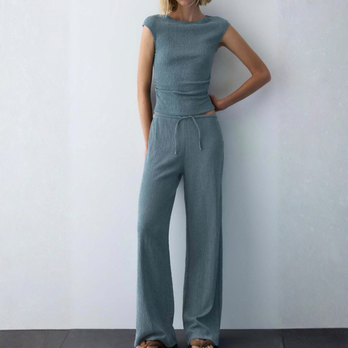 a model wearing the Pull & Bear Blue Crinkle Co-Ord from Closet Concierge