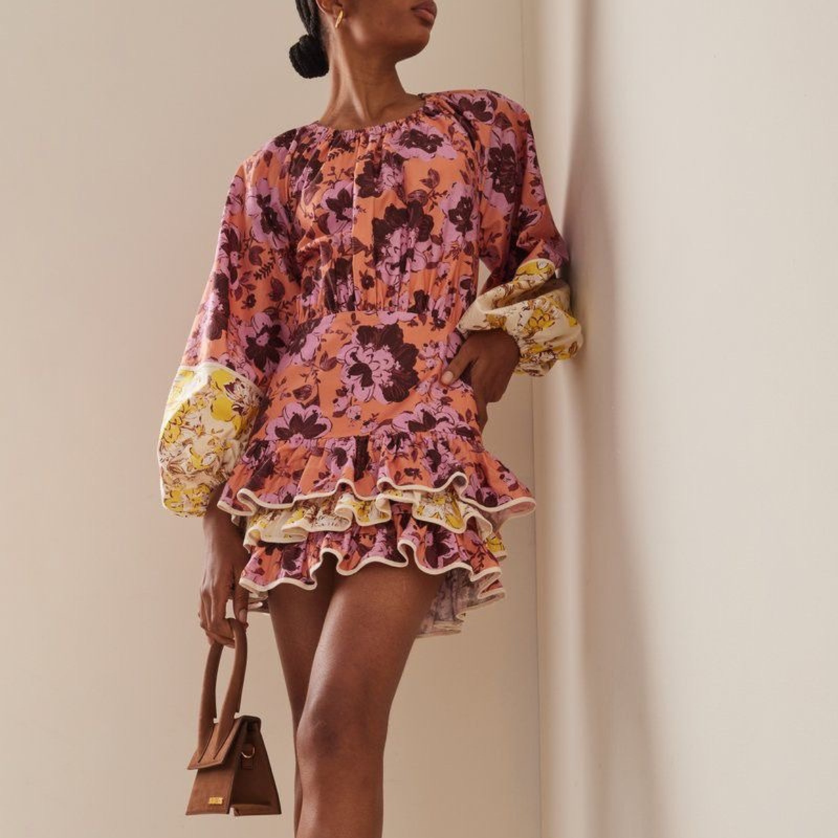 a model wearing the Significant Other ‘Ana’ Floral Mini Dress from Closet Concierge