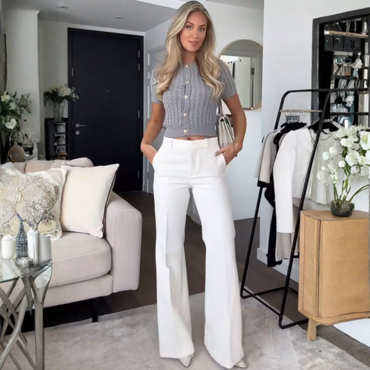 a model wearing the Zara White Cigarette Pants from Closet Concierge