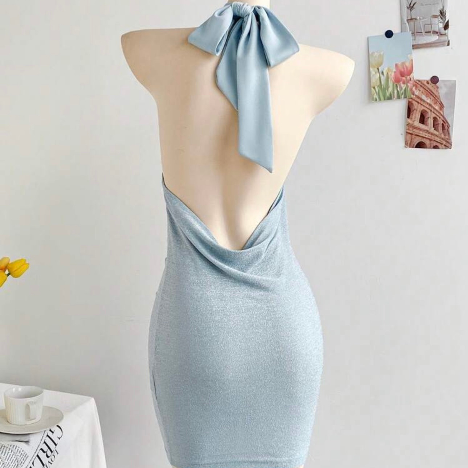 light blue sparkly halterneck mini dress shown from the back from closet concierge