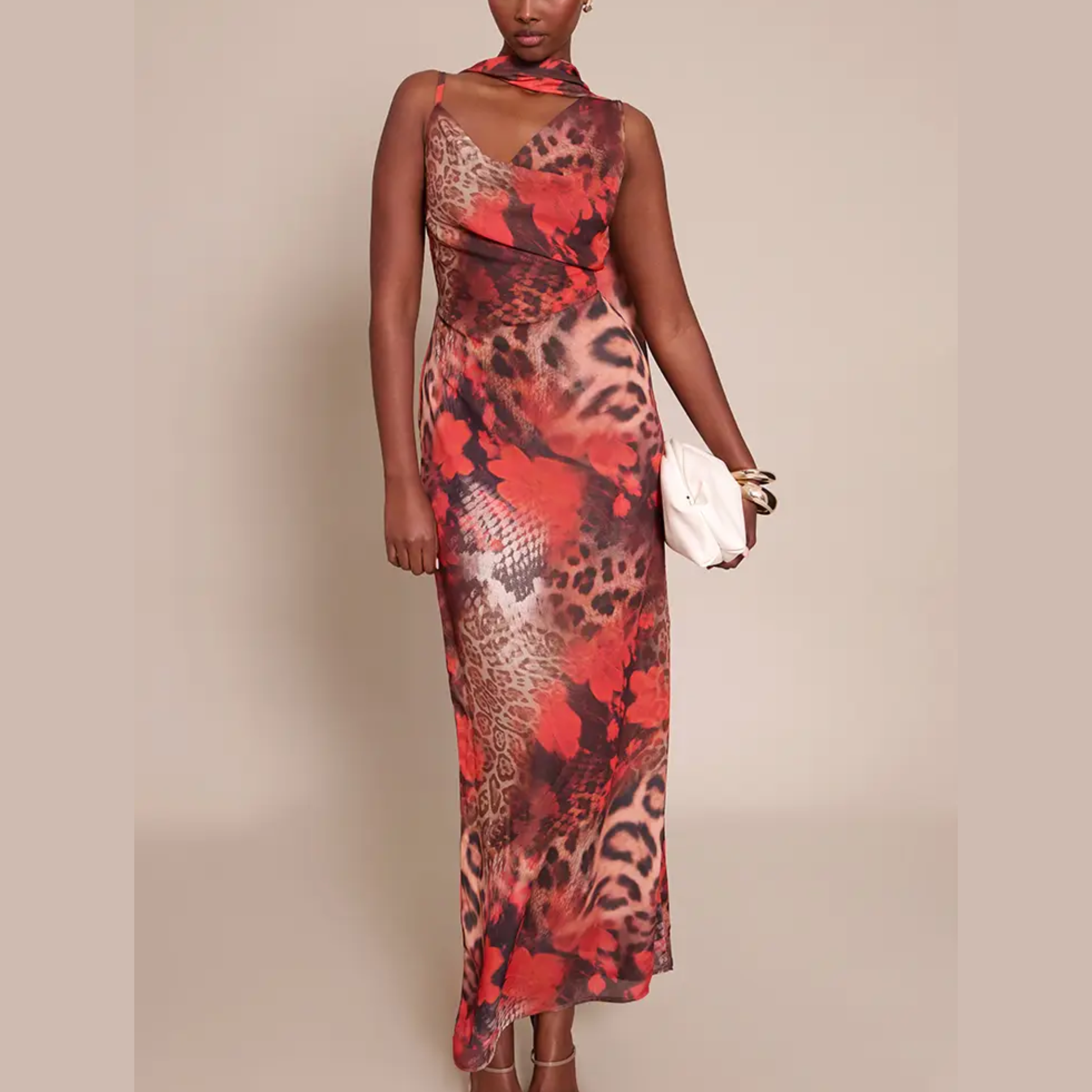 a model wearing plt leopard print floral maxi dress from closet concierge