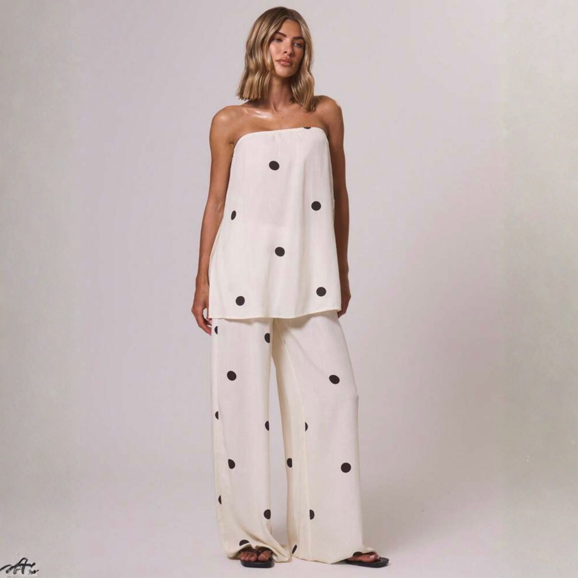 model wearing the closet concierge polka dot bandeau co ord set