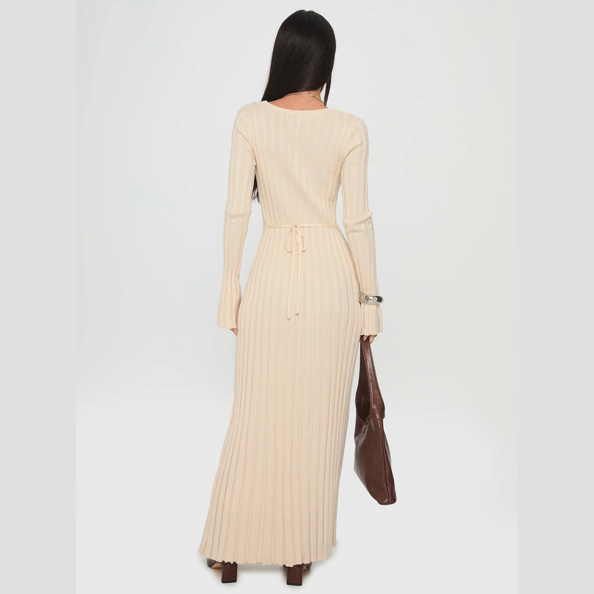 woman wearing a princess polly maxi dress from the back 